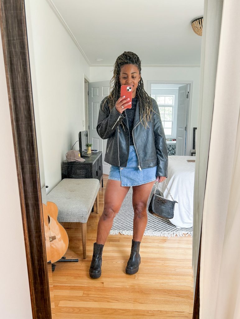 Leather jacket with denim mini skirt