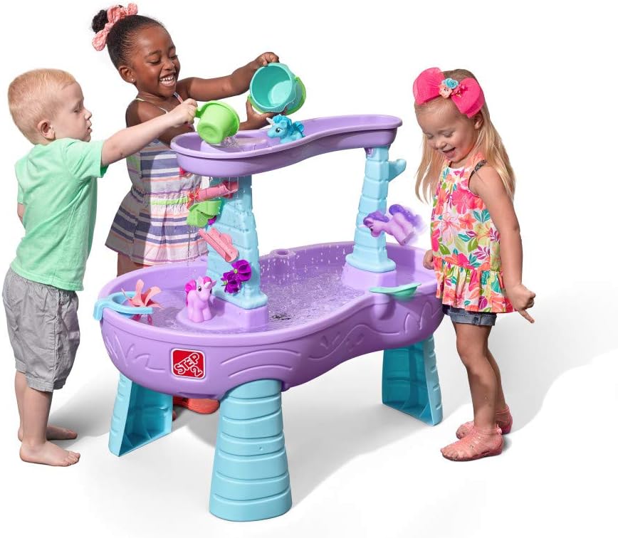 Kids playing at water table