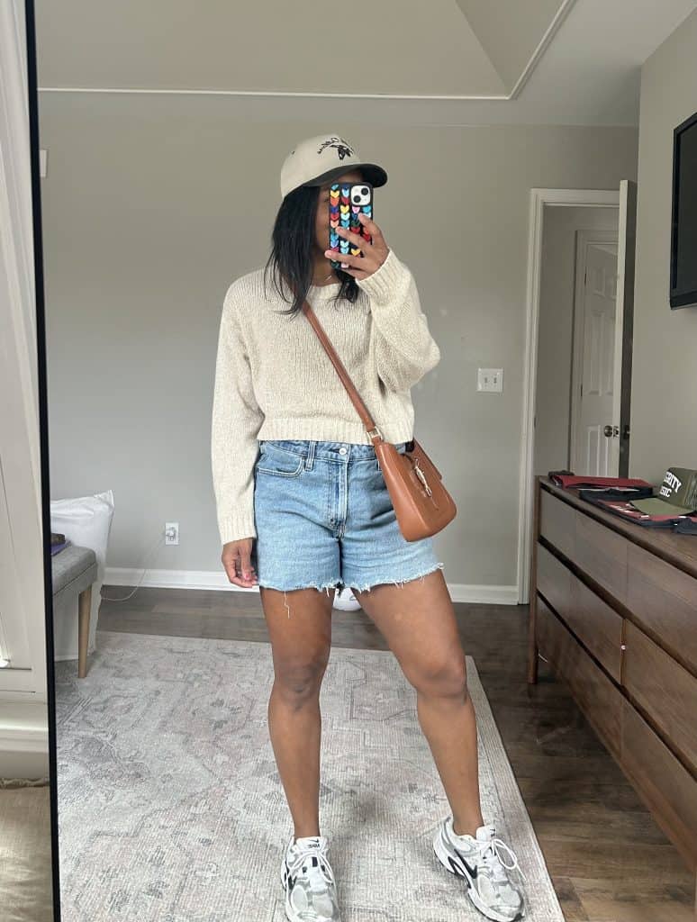 Spring outfit ideas female: Cropped Sweater, Denim Shorts and Sneakers